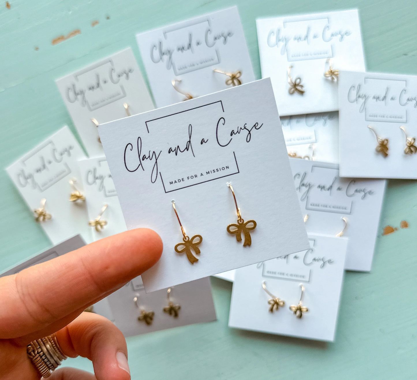 Tiny Bow Earrings from Clay and a Cause
