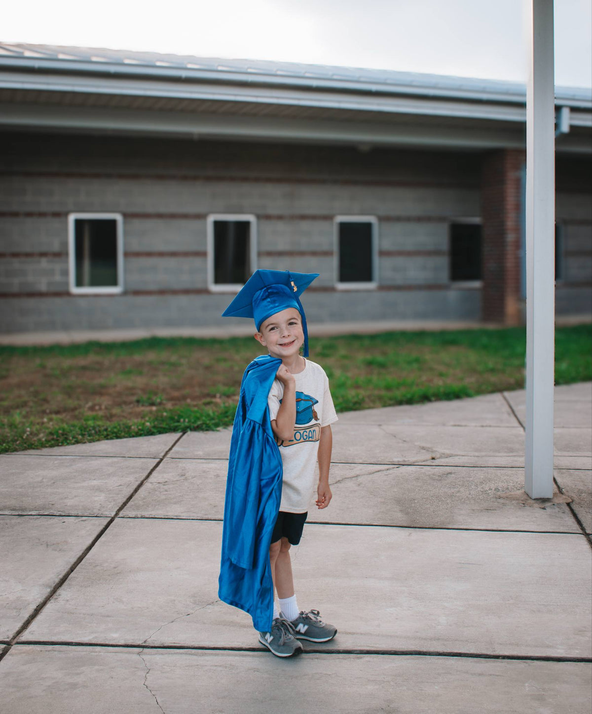 Blue Cap and Diploma - Graduate